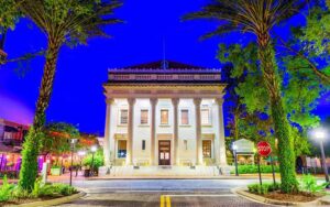 night view of exterior from street with lighted palms at hippodrome theatre gainesville