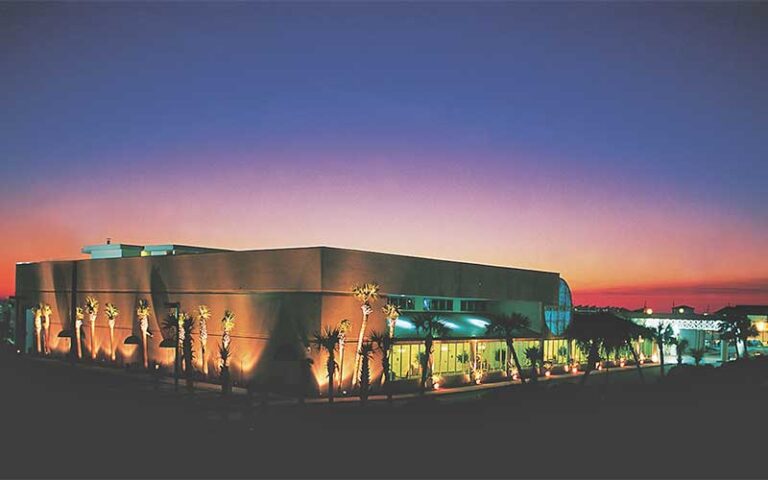 night view with sunset of exterior of convention hall at boardwalk beach hotel convention center panama city beach