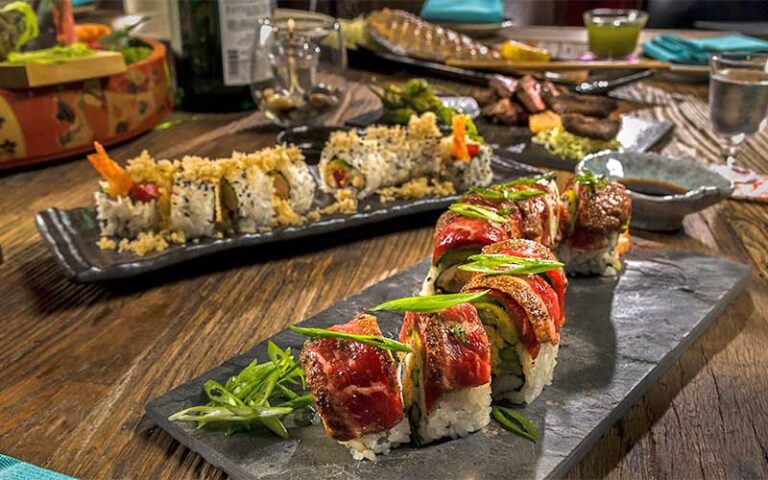 platters of sushi rolls with garnish at dragonfly sushi sake company gainesville