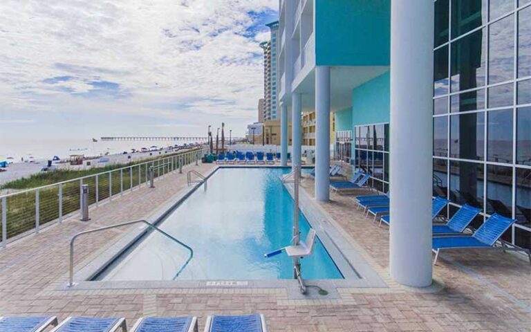 pool deck at base of high rise at hampton inn suites panama city beach beachfront