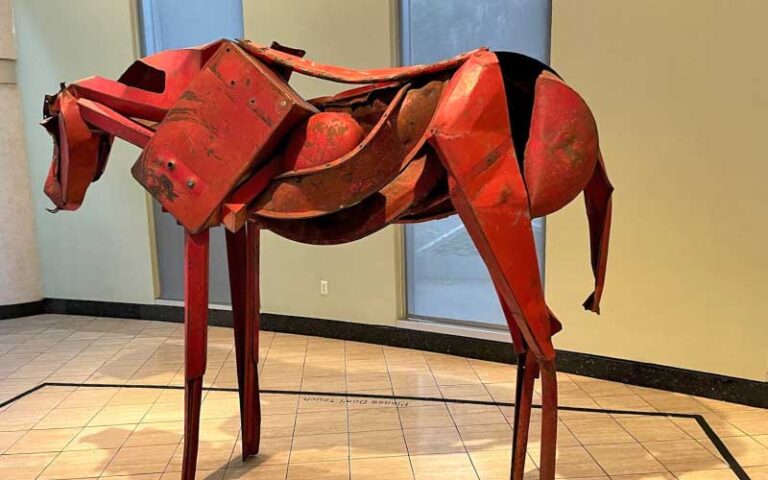 red metal horse sculpture in exhibit space at harn museum of art university of florida gainesville