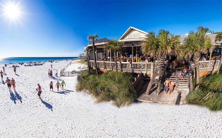 restaurant on beach with customers at schooners panama city beach