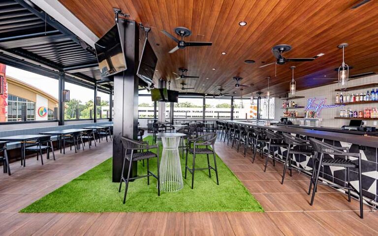 rooftop bar with views and seating at spurriers gridiron grille gainesville