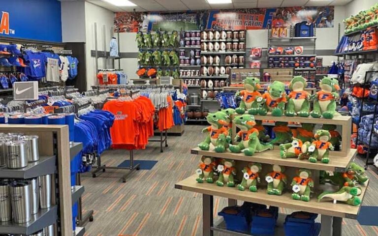 store interior with blue and orange merchandise and apparel at official gator sports shop gainesville