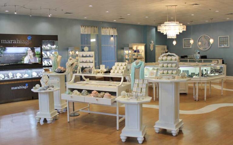 store interior with displays and chandelier at shimmering seas jewelry gifts panama city beach