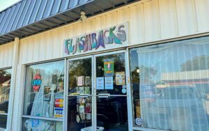 storefront exterior with signs and entrance at flashbacks recycled fashions gainesville