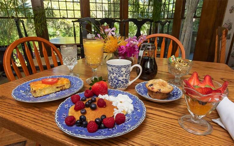 tableful breakfast spread with bay windows at herlong mansion micanopy gainesville