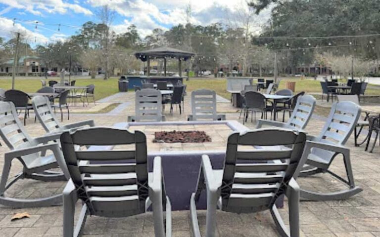 uncovered seating around fire pit at one love cafe gainesville