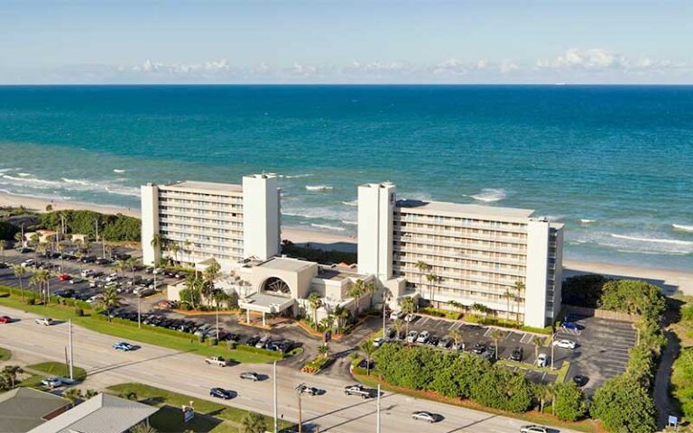 aerial view of high rise hotel on beach at doubletree suites melbourne beach oceanfront