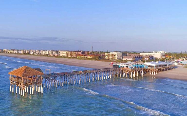 aerial view of long pier on beach at westgate cocoa beach pier