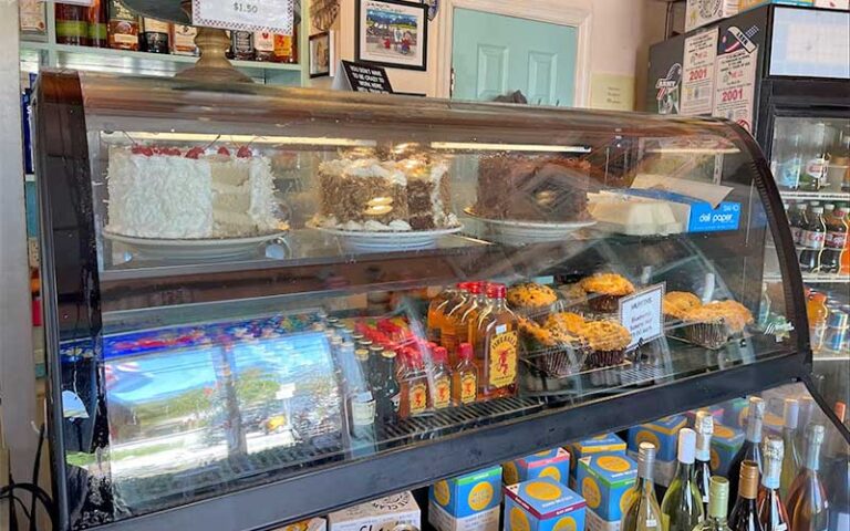 bakery case with cakes and drinks at harpoon harrys key west