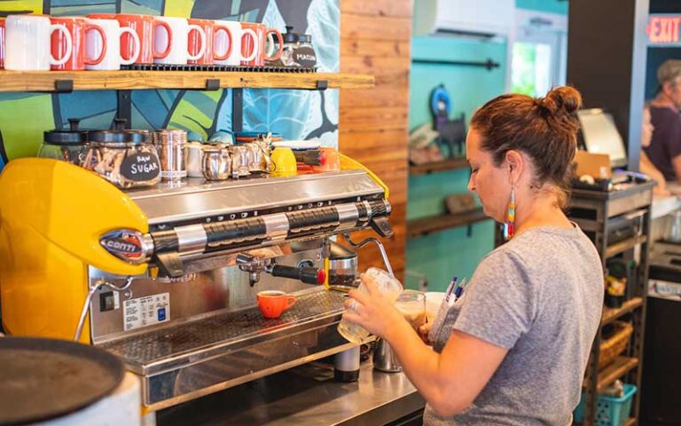 barista pouring shot at espresso machine in diner at moondog cafe key west