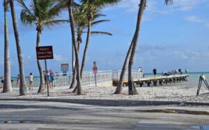 beach park with pier and beach goers at clarence s higgs memorial beach key west