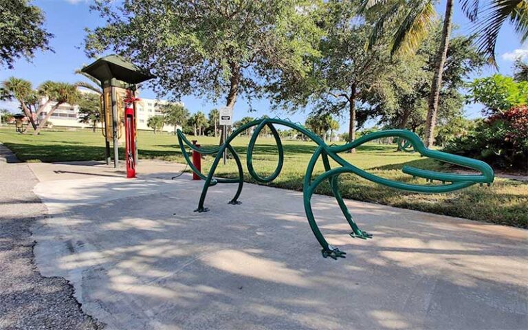 bike rack shaped like alligator along park trail at manatee sanctuary park cape canaveral