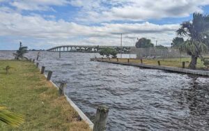 boat ramp beside park overlooking inlet with bridge at sand point park titusville