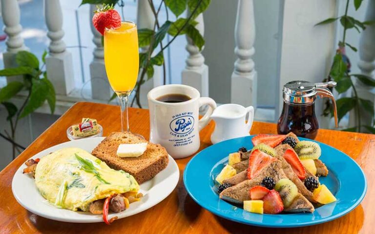 breakfast spread entrees on table at pepes cafe key west