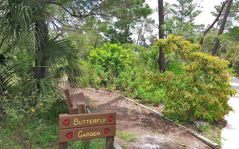 butteryfly garden sign on park pathway at turkey creek sanctuary palm bay