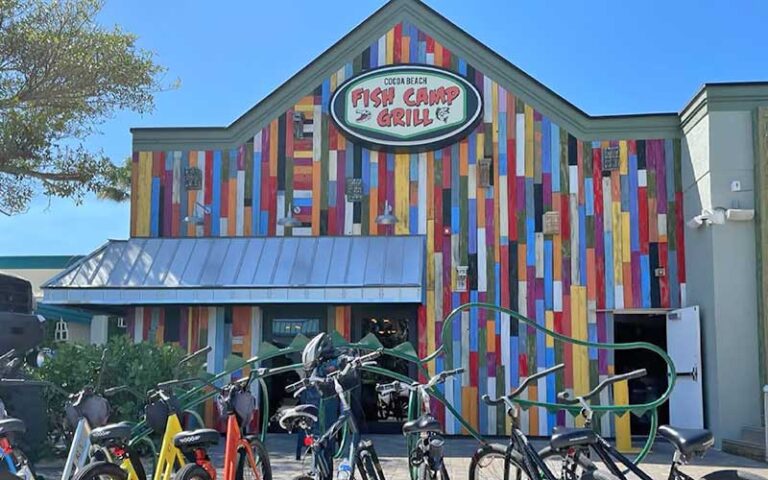 colorful front exterior of restaurant with bicycles at cocoa beach fish camp