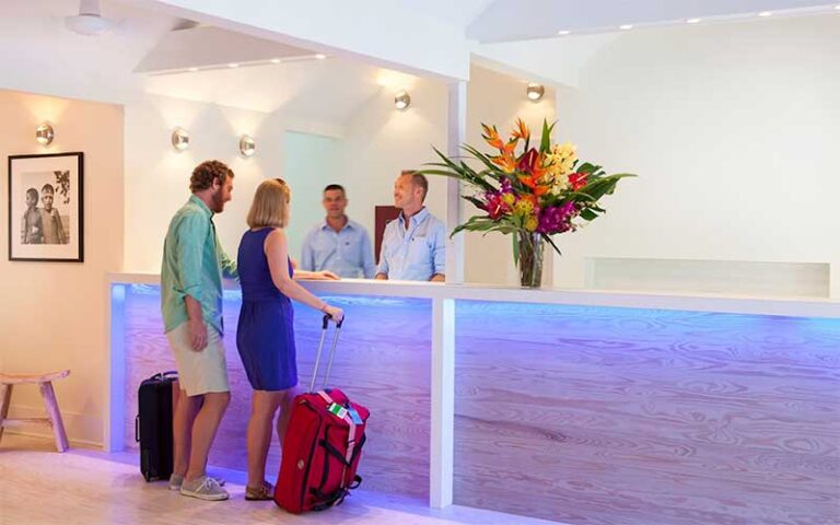 couple checking in at front desk at nyah key west