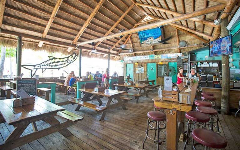 dining room of restaurant with bar at hogfish bar grill key west