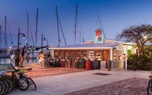 evening view of side of diner and marina at half shell raw bar key west