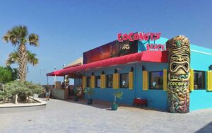 exterior of restaurant with tiki statue at coconuts on the beach cocoa