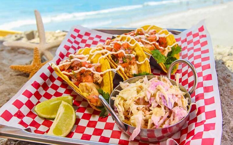 fish tacos with side on tray at pier 62 oceanfront restaurant bar cocoa beach