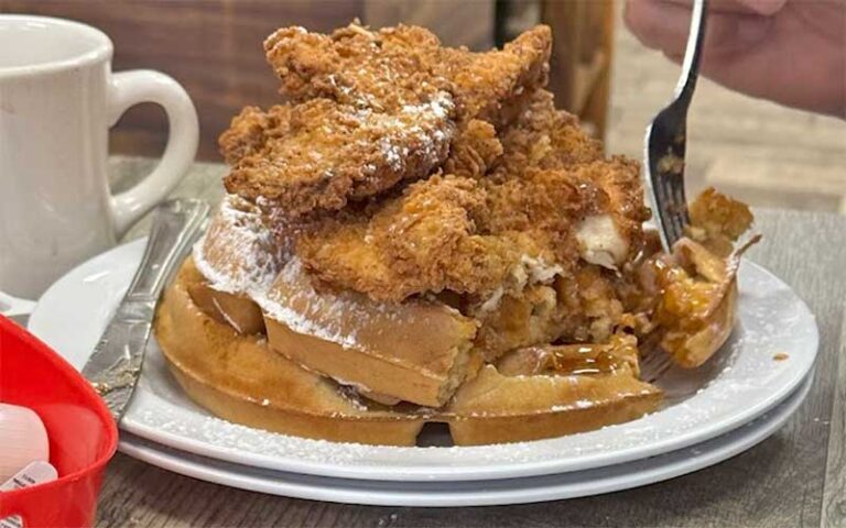 fried chicken and waffles platter at southern charm cafe cape canaveral