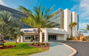 front exterior of high rise hotel at hilton cocoa beach oceanfront