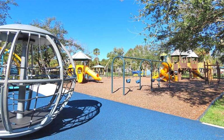 kids playground with slides and swings at sand point park titusville