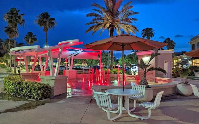 lighted splash pad at night with seating at the avenue viera melbourne