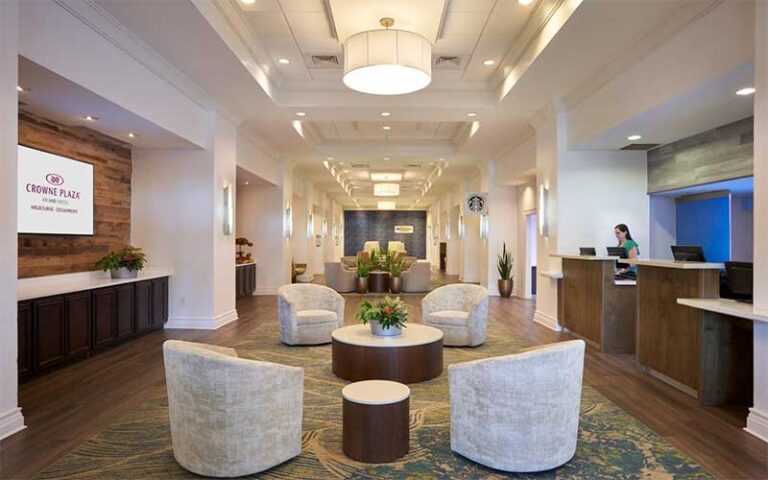 lobby interior with front desk at crown plaza melbourne oceanfront