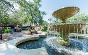 mediterranean style fountain with park benches at the avenue viera melbourne