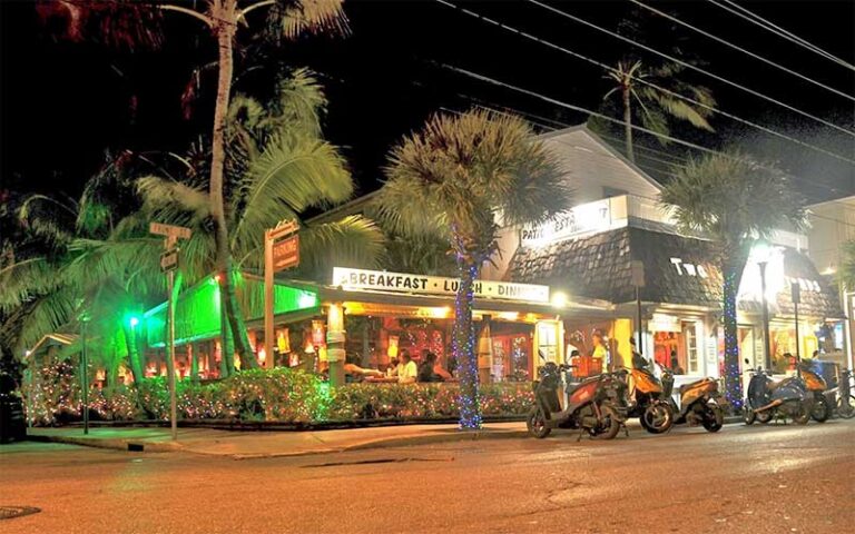 night exterior from street of colorful diner at two friends patio restaurant key west