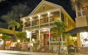 night exterior of house from street at bagatelle key west