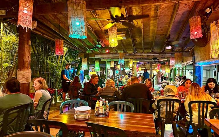 night view of covered dining patio with band at two friends patio restaurant key west