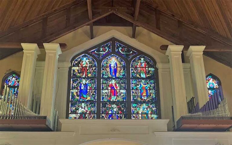 organ loft of church with stained glass window at st pauls episcopal church key west