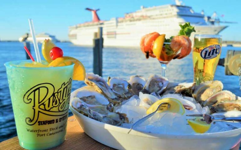 oyster platter with drinks and cruise ship at rustys seafood oyster bar cape canaveral