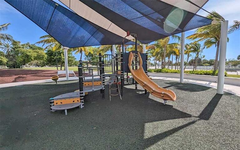 playground with slide under shade canopy at truman waterfront park key west