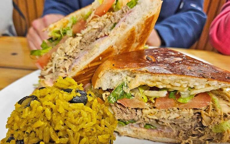 pulled pork sandwich with rice and beans at the tiny turtle cocoa beach