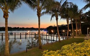 river view at night with dock and tiki torches frigates waterfront bar grill melbourne