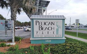 roadside entrance sign on a1a at pelican beach park satellite beach