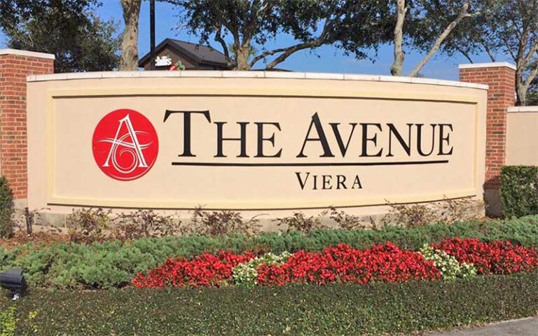 roadside entrance sign with flower beds at the avenue viera melbourne