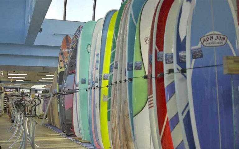 row of surfboards in store area at ron jon surf shop cocoa beach