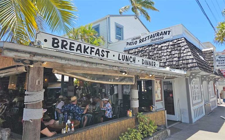 sidewalk exterior of cafe with covered patio dining at two friends patio restaurant key west