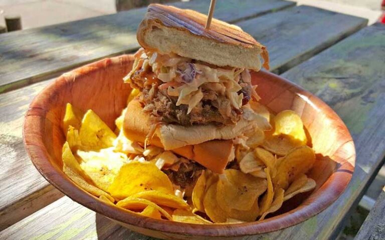 specialty burger on tray with plantain chips at the tiny turtle cocoa beach