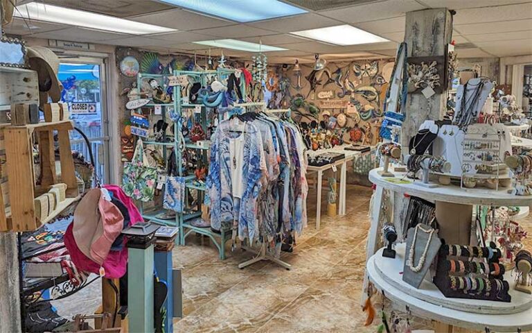 store interior with racks and shelves of products at pelican cove gifts souvenirs cocoa beach