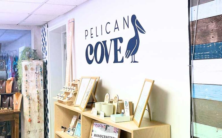 store interior with shelves and logo art at pelican cove gifts souvenirs cocoa beach