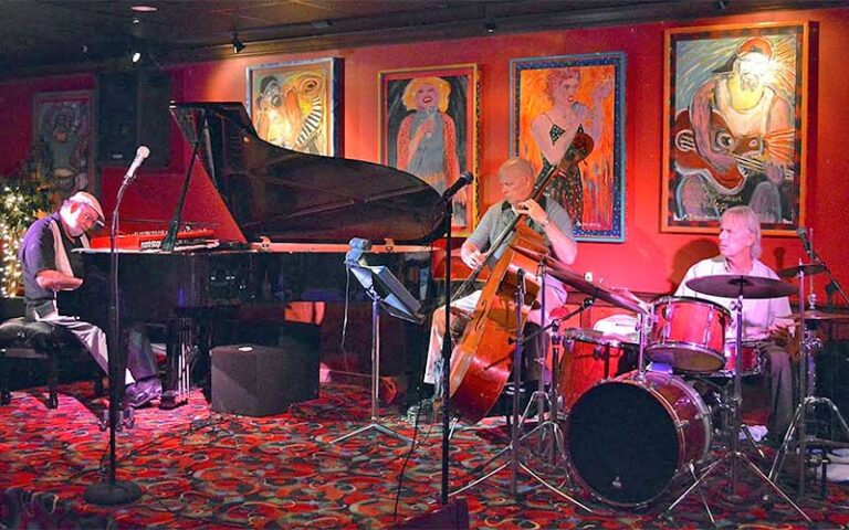 three piece band performing in red room at heidis jazz club restaurant cocoa beach