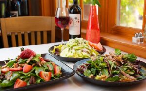 three salad entrees with sangria at santiagos bodega key west